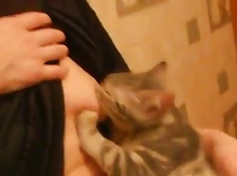 Russian Woman Breastfeeding A Cat